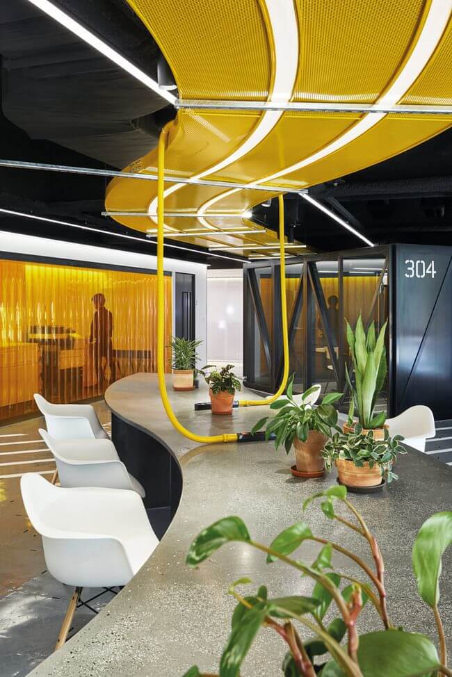 Illuminating Yellow and Ulitmate Gray are at home in an office setting.